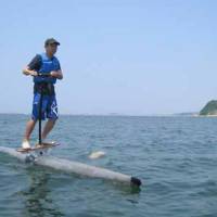 On a roll: By repeatedly shifting his weight from left to right, Tatsuro Yokoi pilots his Swing Roll Flipper in the ocean off Zushi in Kanagawa Prefecture. Mere mortal waddles on water