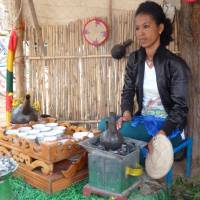 In Aksum, a coffee-ceremony hostess awaits. | LESLEY DOWNER PHOTO