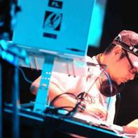 Hitting the deck: DJ Krush at the turntables | MARJORIE BECKER