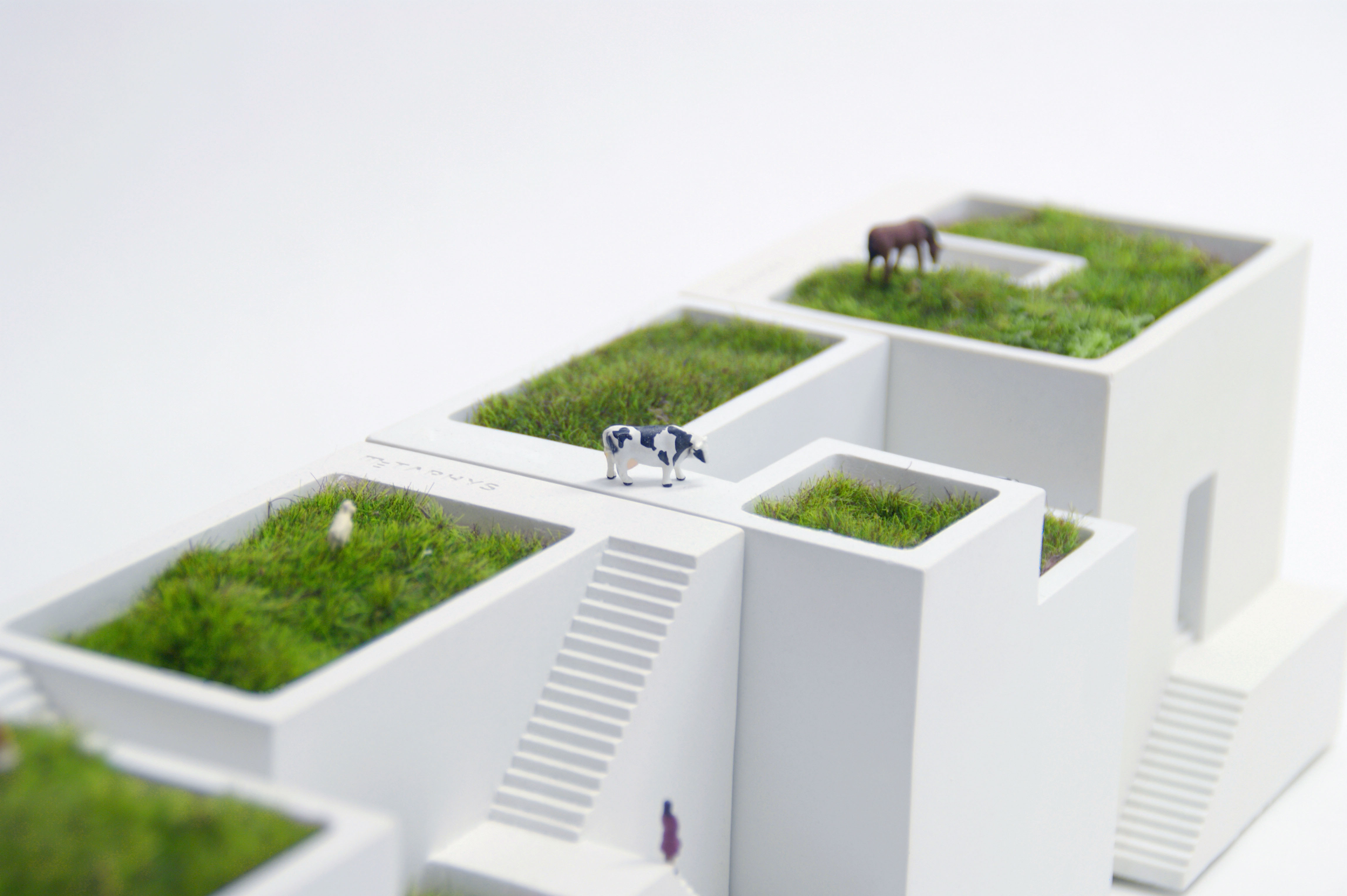 Metaphys' Ienami planters let you create your own mini cityscape. | POOL