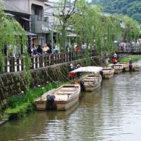 Water margins: Rivers are writ large on the landscape around the ancient towns of Itako and Sawara, where boats are seen moored on the Ono River in Sawara. | MANDY BARTOK PHOTOS