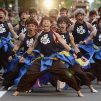 A team participating in the 22nd Sonran Yosakoi shout it all out.  | KYODO