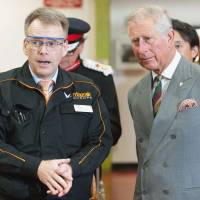 Royal visit: Britain\'s Prince Charles is briefed by an official during a visit to the Yamazaki Mazak factory in Worcester, central England, on Thursday. | KYODO