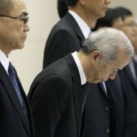 Damage control: Naomi Hirose, president of Tokyo Electric Power Co., bows during a news conference at the utility\'s headquarters last Nov. 7. | BLOOMBERG