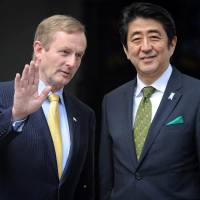 Wet the tea: Irish Prime Minister Enda Kenny welcomes his Japanese counterpart, Shinzo Abe, for a Wednesday meeting in Dublin. | AFP-JIJI