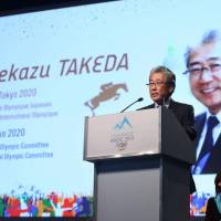 On stage: Japan Olympic Committee president Tsunekazu Takeda presents Tokyo\'s bid for the 2020 Summer Olympics on Saturday in Lausanne, Switzerland, at a meeting of the Association of National Olympic Committees. | TOKYO 2020 BID COMMITTEE/KYODO
