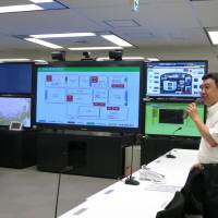 Crisis management: Nuclear Regulation Authority official Shuichi Kaneko speaks to reporters Thursday at the NRA\'s emergency response center in Tokyo. | KAZUAKI NAGATA