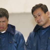 Shipwrecked: Mitsuhiro Iwamoto (left), 46, and newscaster Jiro Shinbo, 57, attend a news conference after they were rescued Friday by the Maritime Self-Defense Force in the Pacific Ocean. Iwamoto, a veteran sailor who is visually impaired, and Shinbo left Onahama port in Iwaki, Fukushima Prefecture, on Sunday bound for San Diego, California, but ran into stormy weather. | KYODO