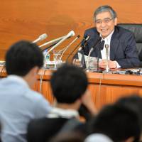 Staying cool: Bank of Japan Gov. Haruhiko Kuroda fields questions after the central bank concluded its two-day Policy Board meeting in Tokyo on Tuesday.  | AFP-JIJI