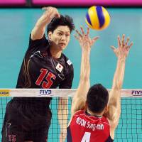 In position: Japan\'s Daisuke Yako spikes the ball against South Korea\'s Moon Sung-min during the teams\' FIVB World League Pool C match in the intercontinental round on Saturday. South Korea defeated visiting Japan in four sets. | KYODO