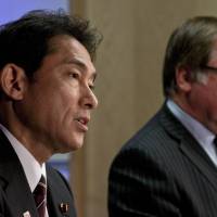 Japan\'s Foreign Affairs Minister Fumio Kishida answers a question Sunday at a joint press conference in Auckland  with his New Zealand counterpart Murray McCully. | AFP-JIJI