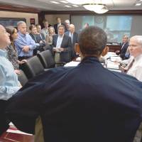 Under scrutiny: President Barack Obama talks with members of his national security team in the White House Situation Room on May 1, 2011, during a series of meetings to discuss the mission to hunt down al-Qaida chief Osama bin Laden. | AP
