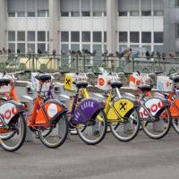 Green machine: Citybike bicycles await customers at a subway station in Vienna. Faced with growing traffic and unenviable pollution levels, the Austrian capital is pursuing a five-year plan to tempt residents out of cars and onto bicycles. | HERZI PINKI