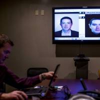 Digital detective: A method of facial mapping is demonstrated in Clearwater, Florida, on June 4 by Scott McCallum, systems analyst and co-administrator of the facial recognition program for the Pinellas County Sheriff\'s Office. | THE WASHINGTON POST