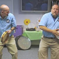 Machine drum: Adam Mason (left) and Alan Yellowitz lead a rhythm enhancement session at Arden Courts Memory Care Community, home to a number of Alzheimer\'s patients, in Annandale, Virginia, earlier this month. | THE WASHINGTON POST