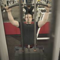 Getting back in shape: Spencer works out at the gym in suburban Houston. At 183 cm tall and 113 kg, Spencer sometimes enjoys working out, but his mother worries that it also may be a manifestation of a manic phase. | THE WASHINGTON POST