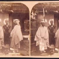 Unearthed: Never-before published stereoscopic photographs, taken in Japan c. 1860 by the mysterious American photographer John Wilson, were recently discovered among documents in a German archive, including this photo of priests at a temple in Oji. | COURTESY OF GEHEIMES STAATSARCHIV, PREUSSISCHER KULTURBESITZ