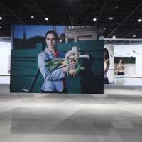Salad days: A view of Tsuyoshi Ozawa\'s \"Vegetable Weapon\" series of photographs. | COURTESY OF THE HIROSHIMA CITY MUSEUM OF CONTEMPORARY ART