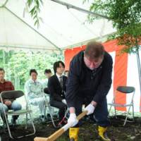 Easy does it: Old Nic placates the gods in a ceremony before the construction of a clubhouse in The C.W. Nicol Afan Woodland Trust. | KENJI MINAMI PHOTO