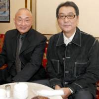 Anticipation: Director Yojiro Takita (right) sits with producer Yasuhiro Mase. The director declined to speculate on his chances of winning a Best Foreign Language Film Oscar. | YOSHIAKI MIURA PHOTO