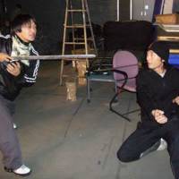 Chop, chop: Kenji Tanigaki (left) demonstrates a move on the set of \"Yamimusha 2.\" | MARK SCHILLING PHOTOS