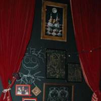 Artwork by sometime patron Tim Burton adorns the wall of Sumire no Tenmado in Golden Gai. | IMAGES COURTESY OF THE MUSEUM OF MODERN ART, SHIGA
