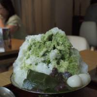 Ice-cool: Kagigori, shaved ice with syrup, pictured here with green-tea syrup and condensed milk, is one of many traditional ways to beat the heat in Japan. | MIO YAMADA