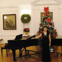Multitalented: Mitsuru Claire Chino is also a classically trained singer and performs semi-professionally. Here she poses by the grand piano at a concert at Yale University in 2007. | PHOTO COURTESY OF MITSURU CLAIRE CHINO