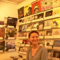 Spin doctor: Escalator Records\' Haruka Naka in the indie-specialist company\'s Harajuku, Tokyo, shop with some of its new 45s in racks on the wall behind | DAVID HICKEY PHOTOS