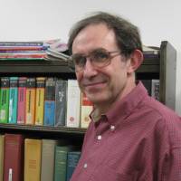 In the name of harmony: Columnist Thomas Dillon takes on life in Japan with disarming and often self-depracating wit that never alienates. Here, the camera-shy Dillon is caught in the staff room at Tokyo\'s Sophia University, where he holds a post as part-time professor. | MARIKO KATO PHOTO