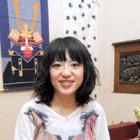 Rockin\' out: Misako Takashima, known by her pen name of Misako Rocks!, says she hopes to help young people through her comics, which often feature themes such as high school romance, friendship and cross-cultural exchange. | SATOKO KAWASAKI PHOTO