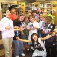 For the fans: Misako Takashima (front) poses with young fans after speaking at a New Jersey library in May 2009. | MISAKO ROCKS!