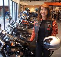 Bikes galore: Chiemi Svensson stands in the Harley-Davidson showroom in Bangkok. Bikes starlet of Bangkok rides high
