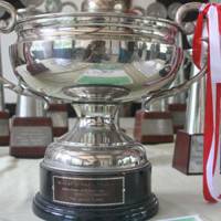 We are the champions: This year\'s The Japan Times Cup (above), which is awarded to the men\'s doubles champions, went to (below) Yohei Ishida (left) and Yukimichi Kakimoto. | EDAN CORKILL PHOTOS