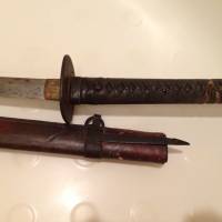 War trophy: A sword carried by an Imperial Japanese Army soldier killed in a gunbattle with U.S. forces in mountains near the Philippine capital, Manila, in 1944. Reader TT would like to return the sword, which he inherite d from his grandfather, to the late Japanese soldier\'s family. | THE WASHINGTON POST