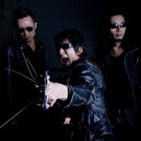 Fangs for everything: Guitar Wolf\'s drummer Toru (left), guitarist/ vocalist Seiji (center) and bassist U-G (right) are back and baying for blood. | TAKAYUKI MISHIMA PHOTO