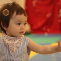 Bubbles mesmerize Kiko during a class at Tokyo Creators. | DANIELLE DEMETRIOU