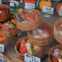Ocean bounty: Appetizing fare at one of some 100 sushi shops in Otaru ? of which 20 are in Sushiya Dori. | ANDREW KERSHAW PHOTO