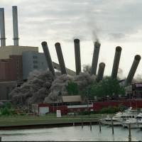 All fall down: The historic \"Seven Sisters\" smokestacks of Detroit\'s Conner Creek power plant are toppled in August 1996. Erected between 1914 and 1921, the seven 105-meter-tall chimneys became a city landmark, serving as a symbol of its industrial might and a navigational beacon for generations. | AP