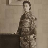 Prime of life: Hisako Miyake wearing a kimono poses for a portrait in this undated handout photograph taken in her 20s in a photo studio in Nara. | THE MATSUYAMA FAMILY/BLOOMBERG