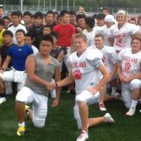 Cultural exchange: Ashland High School (Oregon) football players meet their counterparts from the Japan All-Stars earlier this week in Kyoto. The teams will compete in Pacific Rim Bowl XIII on Saturday in Kobe. Ashland set to take on Japan prep stars in Pacific Rim Bowl