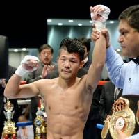 Still the champion: Koki Kameda retains his WBA bantamweight title, beating John Mark Apolinario on Tuesday at Tokyo Big Sight. | KYODO