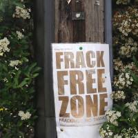 Keep the frack away: An anti-fracking protest sign is seen near Cuadrilla Resources Ltd.\'s exploratory shale gas drill site in West Sussex, England, on July 5. Plans to exploit extensive shale gas reserves in the U.K. have divided public opinion. | BLOOMBERG