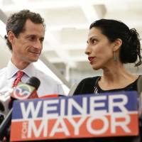 I\'m with  Weiner: Huma Abedin stands alongside her husband, New York mayoral candidate Anthony  Weiner, during a news conference in New  York on  Tuesday. | AP