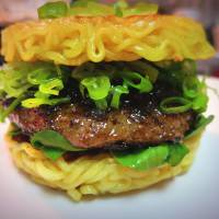 Who needs buns: Keizo Shimamoto and his ramen burger, which he serves to long lines of hungry diners in New York. The ramen burger that ate New York