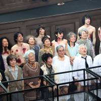 Judgment day: Joy lights the faces of cast members from SGT and fellow Saitama-based troupe Next Theater during a rousing curtain call in Paris in May. | &#169; MAIKO MIYAGAWA