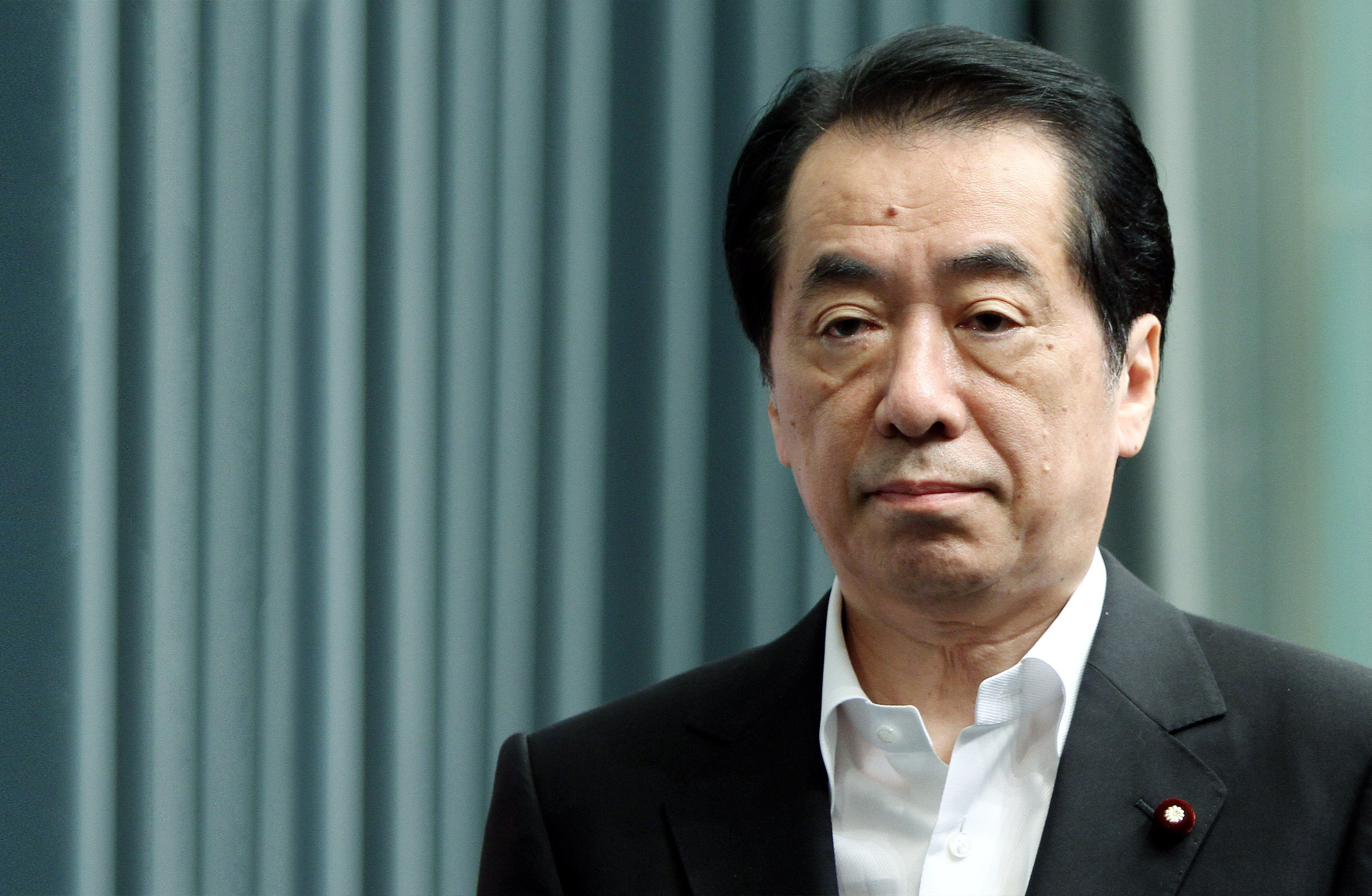 Top man: Then-Prime Minister Naoto Kan addresses  reporters July 13, 2011. | BLOOMBERG