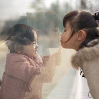 An early candid shot of Nagano\'s daughters, Kanna and Miu (right).  | © TOYOKAZU NAGANO