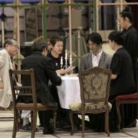 Actors Takehiko Ono (left, who plays retired General  Ilya Shamrayev), Otake and Nomura run through a dinner scene with other cast members. | TAKASHI KATO