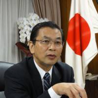 Economy booster: Newly appointed Economy, Trade and Industry Minister Akihiro Ohata speaks to the media at his office in Tokyo on Wednesday. | KAZUAKI NAGATA